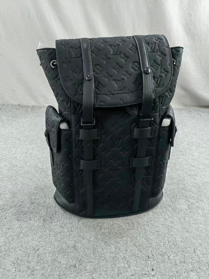 Old Flower Embossed Cowhide Leather Backpack