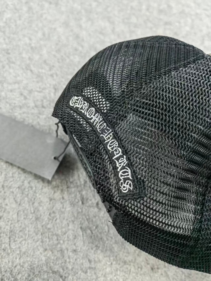 Sanskrit letter cross trucker hat