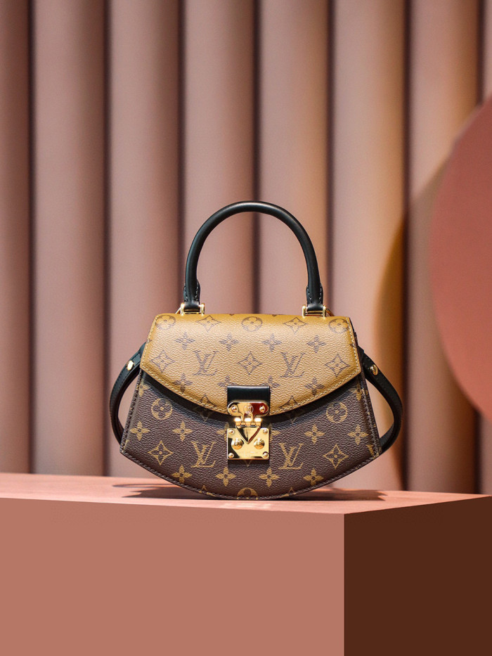 Louis Vuitton NIGO Leather Printed Irregular Portable Bag  #nigo21126