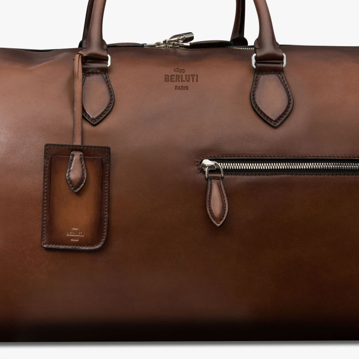 NIGO Berluti Men's Jour Off Vintage Solid Color Multi-Pocket Zipper Closure Padlock Adjustable Shoulder Strap Large Leather Travel Bag #nigo71597