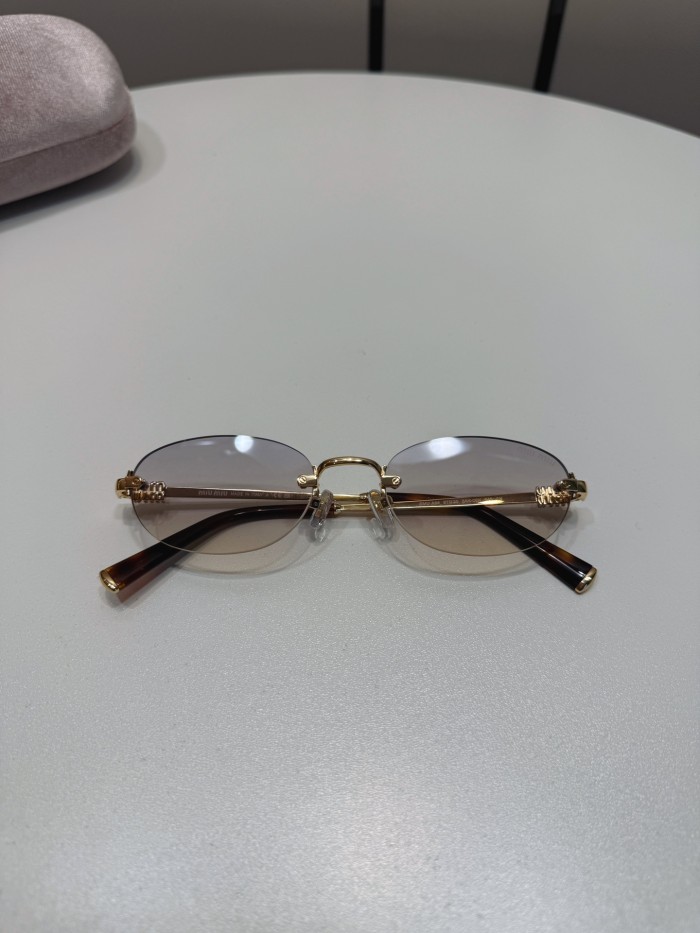 NIGO MiuMiu Men's And Women's Fashion Classic Rimless Oval Lens Temples Logo Sunglasses Eyewear Accessories #nigo78742