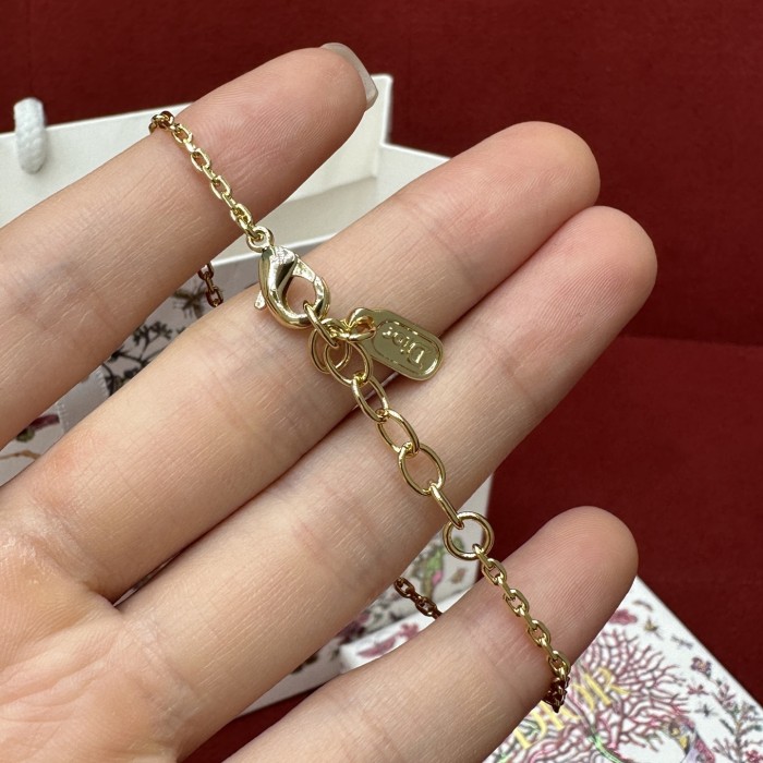 DIOR Delicate Bow Bracelet Gold-Finish Metal and Crystals #379150