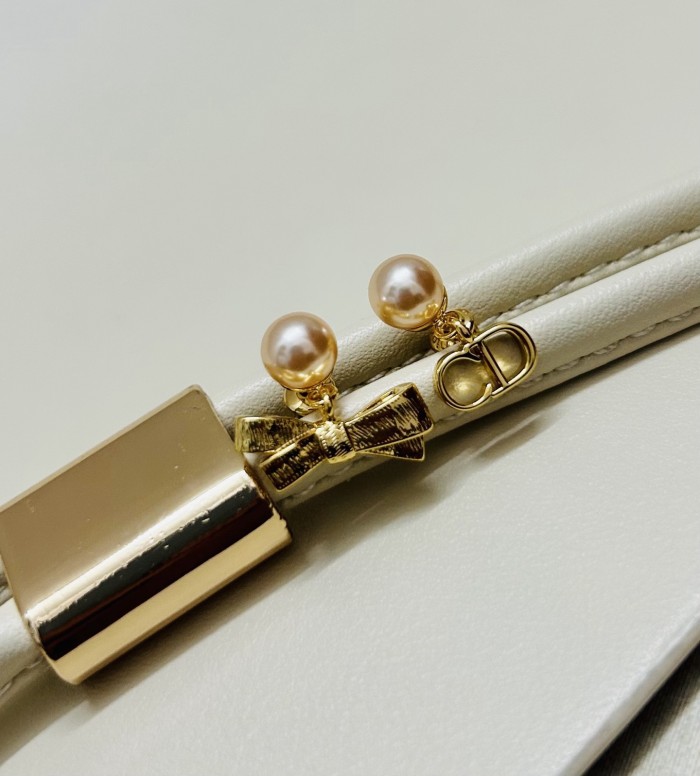 DIOR CD Bow Earrings Gold-Finish Metal and Iridescent Pink Resin Pearls #385665