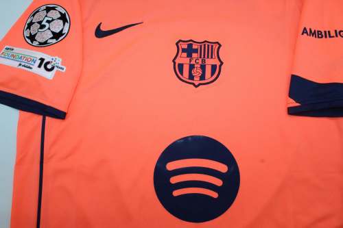 with UCL Patch Barca Camisetas de Futbol Fans Version 2025-2026 Barcelona Third Away Orange Soccer Jersey