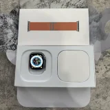 Apple Watch Ultra Titanium Case with Orange Ocean Band